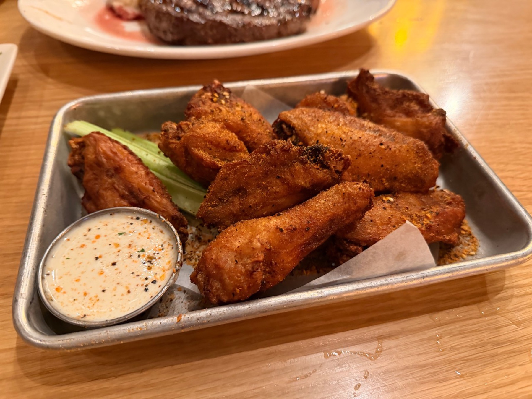 A tray of seasoned chicken wings